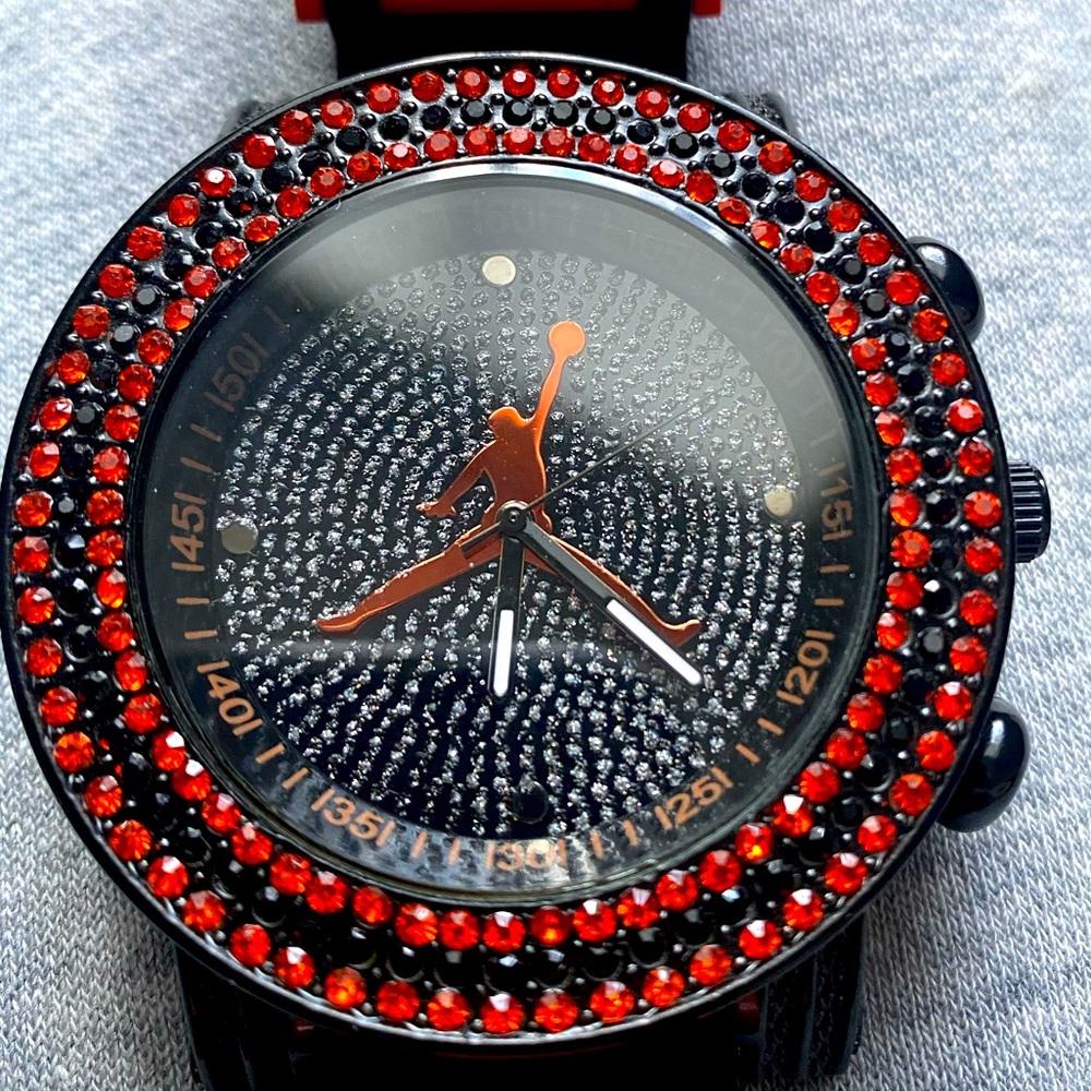 AIR JORDAN BLACK AND ORANGE WATCH. BRAND NEW NEVER WORN. WILL NEED NEW BATTERY.